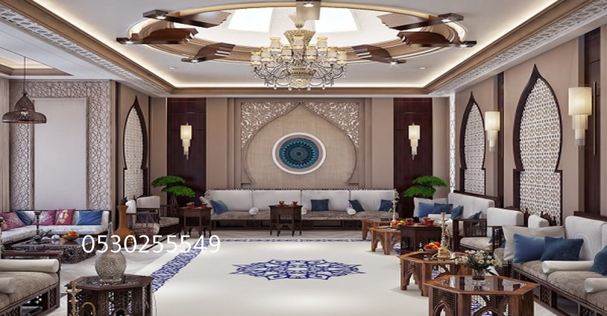 تصميم ديكور مودرن لمساحة مفتوحة تضم المطبخ وغرفة المعيشة.
